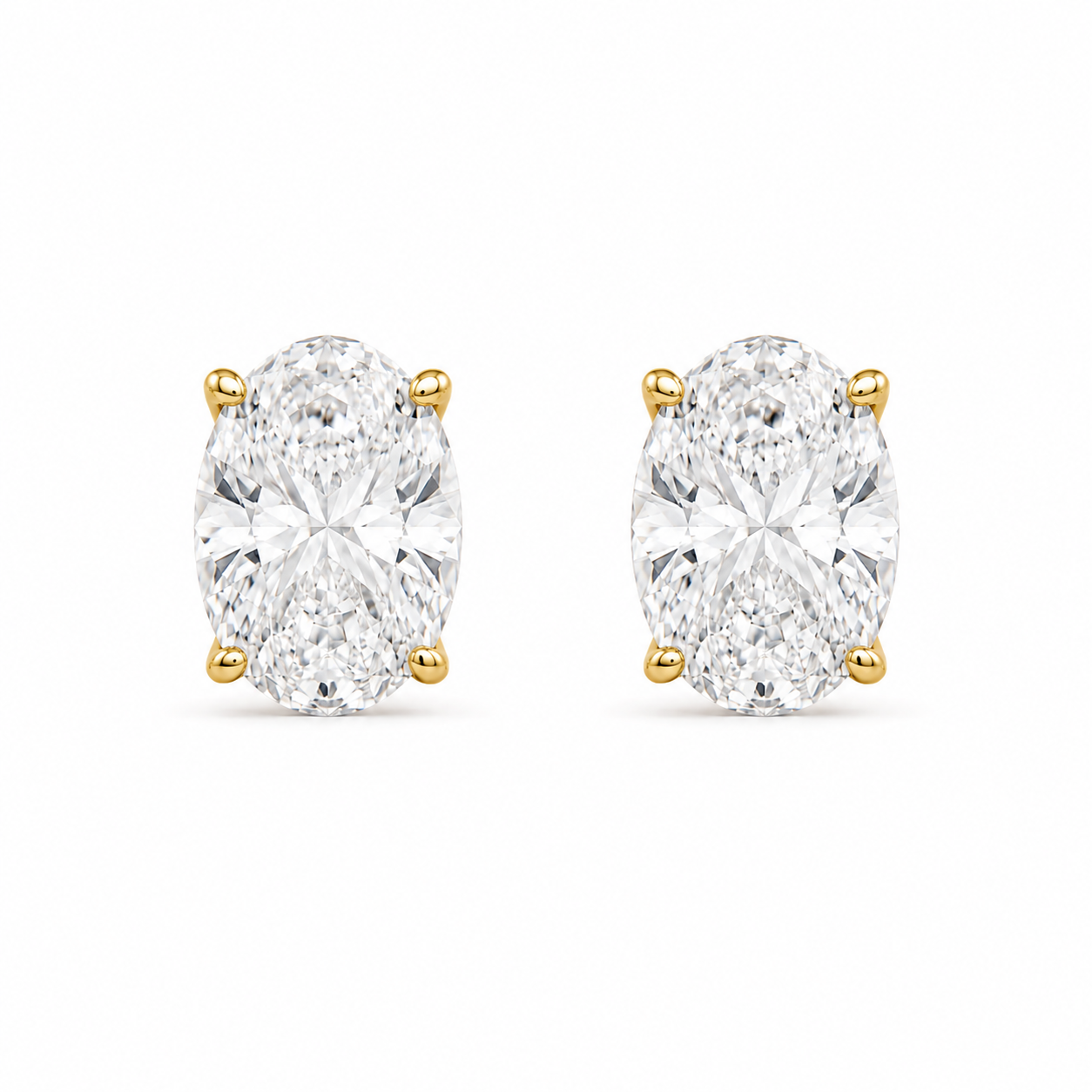 Oval Diamond Studs in gold, 8 x 12 mm oval simulated diamond studs, front view